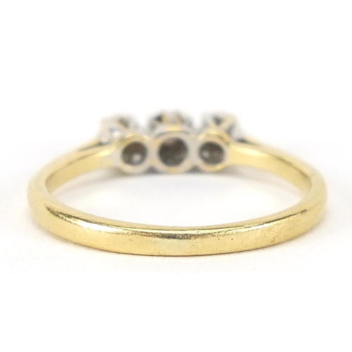 335 - 18ct gold diamond three stone ring, size K, 2.0g