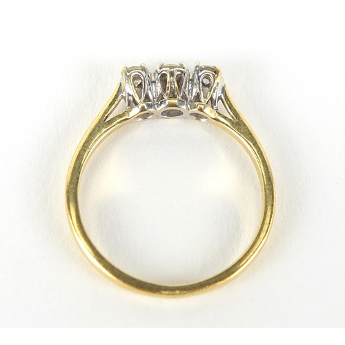 335 - 18ct gold diamond three stone ring, size K, 2.0g