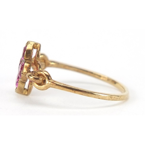 276 - Antique unmarked gold ruby flower head ring, size J, 1.5g