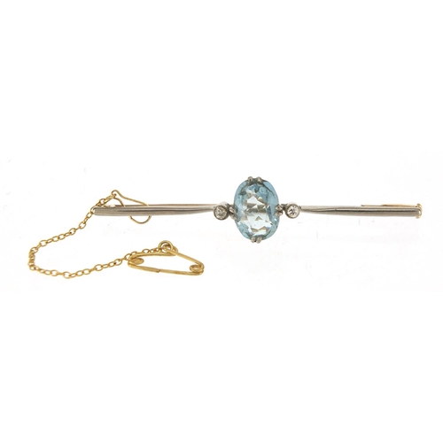 272 - Antique unmarked gold blue stone and diamond bar brooch, possibly aquamarine, 6cm wide, 5.0g