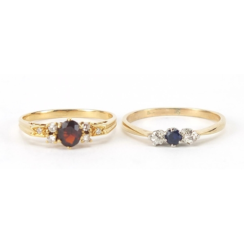 239 - Two unmarked gold rings set with diamonds, sapphire and garnet, sizes L and N, total 3.7g