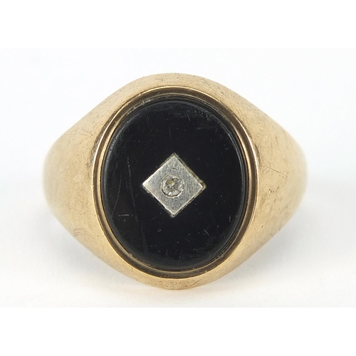 449 - 9ct gold black onyx and diamond signet ring, size Q, 4.0g