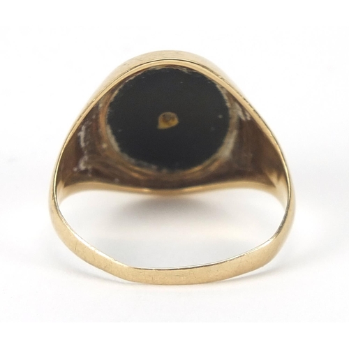 449 - 9ct gold black onyx and diamond signet ring, size Q, 4.0g