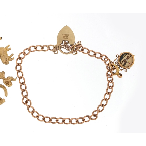 243 - Two 9ct rose gold charm bracelets with a selection of mostly 9ct gold charms including a pixie, rugb... 