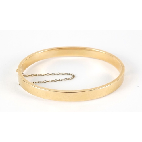 227 - 15ct gold hinged bangle, 6.5cm wide, 10.0g