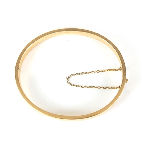 227 - 15ct gold hinged bangle, 6.5cm wide, 10.0g