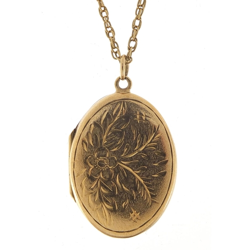 127 - Oval 9ct gold locket with engraved decoration on a 9ct gold necklace, 3cm high and 60cm in length, t... 