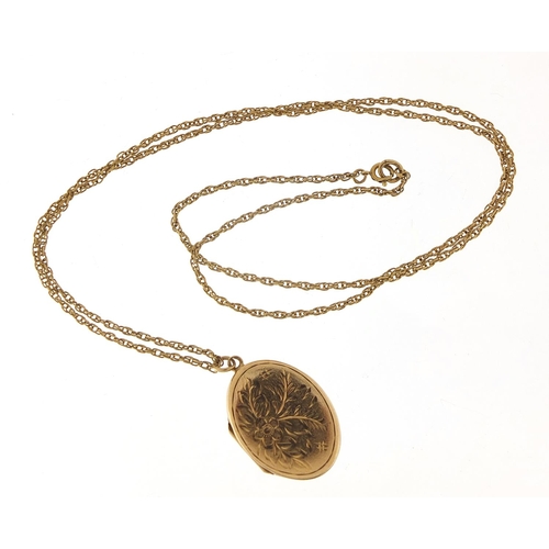 127 - Oval 9ct gold locket with engraved decoration on a 9ct gold necklace, 3cm high and 60cm in length, t... 