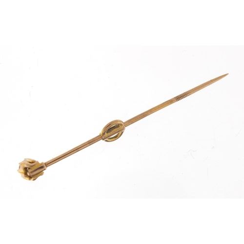 137 - Unmarked gold diamond solitaire stick pin, the diamond approximately 3.5mm in diameter, 6cm in lengt... 