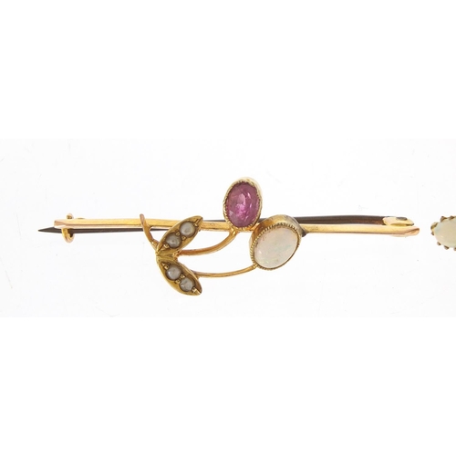 160 - Two 9ct gold bar brooches set with ruby, seed pearls, garnets and opals, the larges 4.5cm wide, tota... 