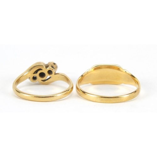 364 - 18ct gold signet ring and 18ct gold diamond three stone crossover ring, sizes L and P, 6.1g