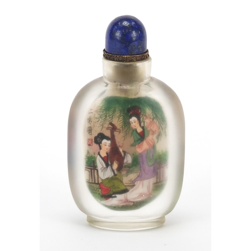 2436 - Chinese glass snuff bottle with hardstone stopper, internally hand painted with females, 10.5cm high