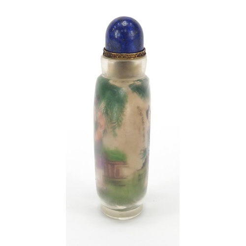 2436 - Chinese glass snuff bottle with hardstone stopper, internally hand painted with females, 10.5cm high