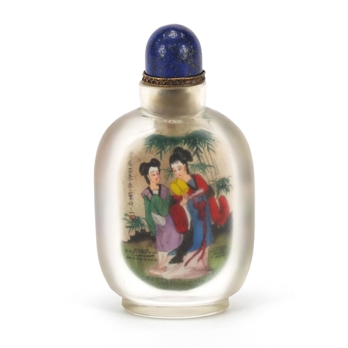 2436 - Chinese glass snuff bottle with hardstone stopper, internally hand painted with females, 10.5cm high