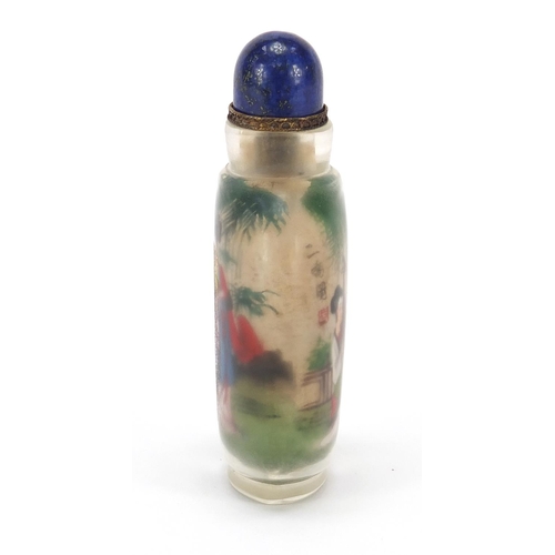 2436 - Chinese glass snuff bottle with hardstone stopper, internally hand painted with females, 10.5cm high