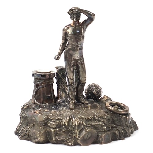 2813 - Elkington & Co silver plated stand with a sailor and lifebuoy, 22cm high