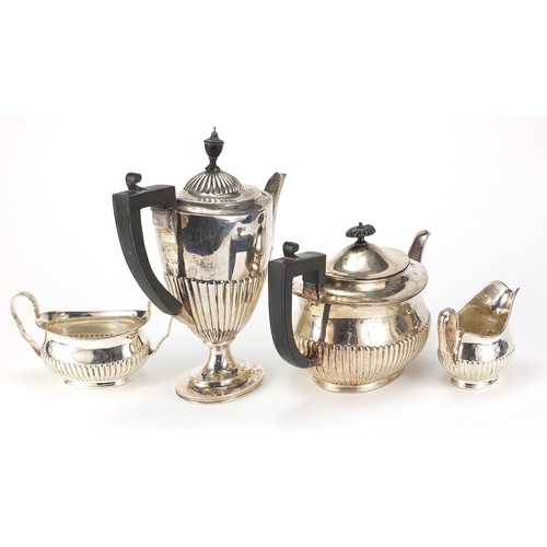 627 - Victorian silver four piece demi fluted tea and coffee service with ebonised handles and knops, Lond... 