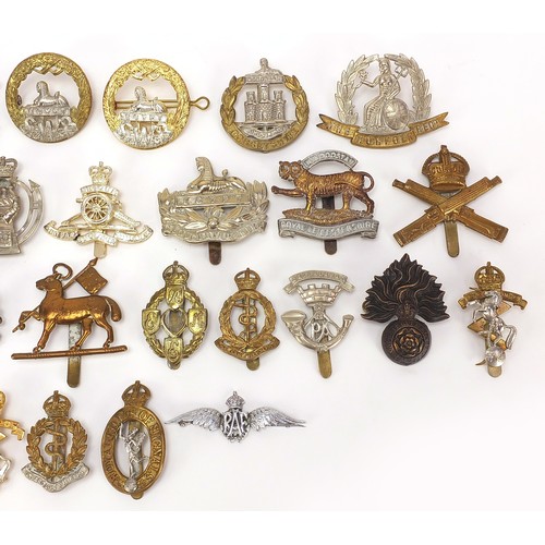 3472 - British militaria including Royal Air Force brooch, naval buckle, silver and enamel Hampshire brooch... 