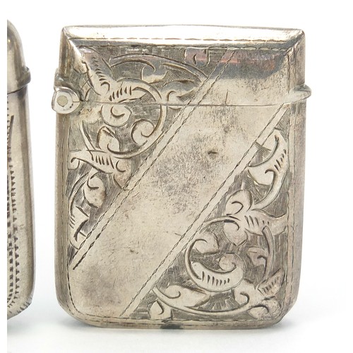 697 - Three Victorian silver vestas with engine turned and engraved decoration, Birmingham hallmarks, the ... 