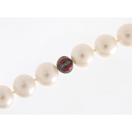 435 - Cultured pearl necklace with 18ct white gold clasp and red glass marcasite spacers, 44cm in length