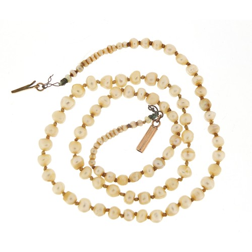 51 - Antique graduated pearl necklace with 9ct gold clasp, housed in a tooled leather box, 42cm in length