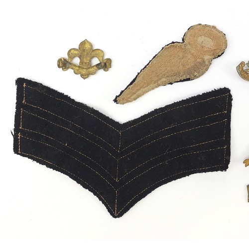 3478 - British militaria including cloth patches, Queen Mary's Regiment Surrey Yeomanry cap badge and a but... 