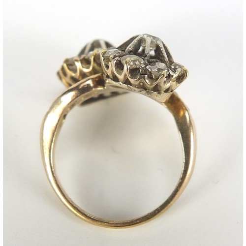 347 - Antique unmarked gold diamond cluster crossover ring, the larger diamonds approximately 2.8mm in dia... 