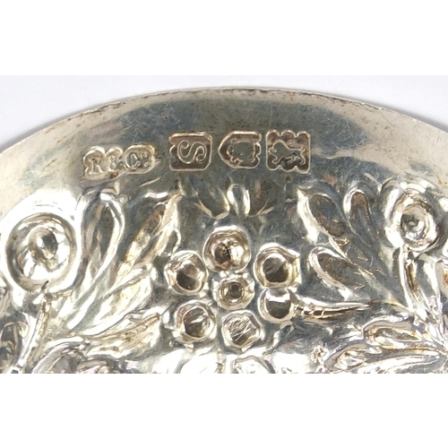 577 - Robinson & Co Ltd, pair of George V silver fruit spoons embossed with flowers and foliage, London 19... 