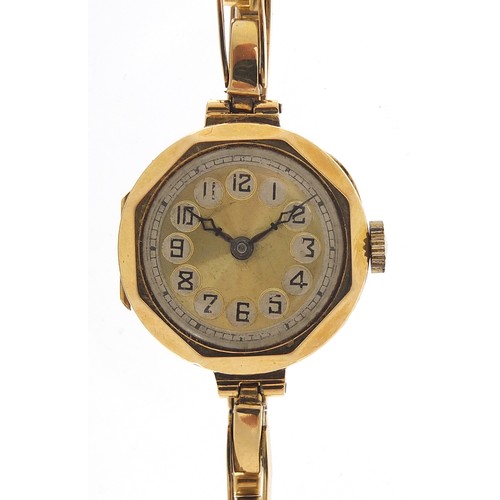 256 - Ladies 18ct gold wristwatch with 18ct gold strap, the case 20mm wide, 17.0g