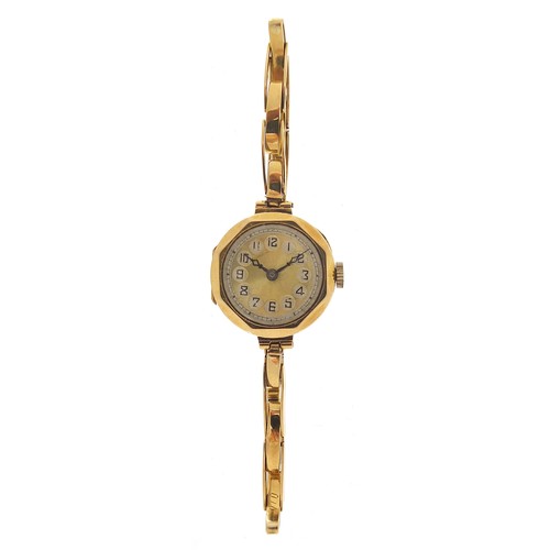 256 - Ladies 18ct gold wristwatch with 18ct gold strap, the case 20mm wide, 17.0g