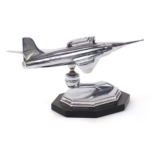 290 - Vintage chrome plated table lighter in the form of a jet aircraft, 24cm in length