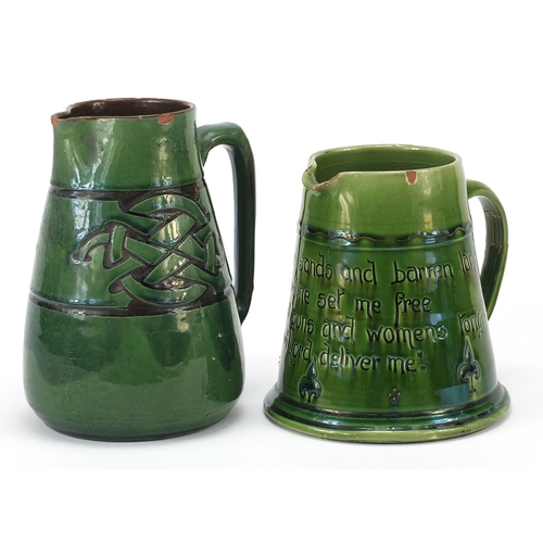 379 - C H Branham, two green glazed jugs made for Liberty & Co, the largest 19cm high