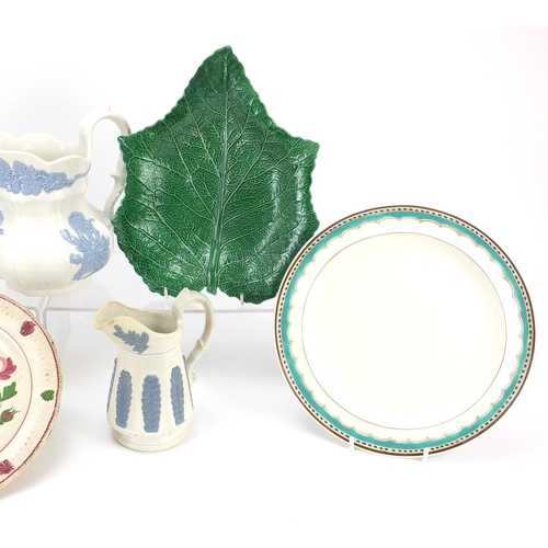 355 - Early 19th century Swansea pottery including two jugs, plate hand painted with roses and two green g... 