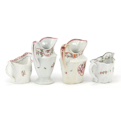 344 - Four 18th century Newhall cream jugs hand painted with flowers, the largest 11.5cm high