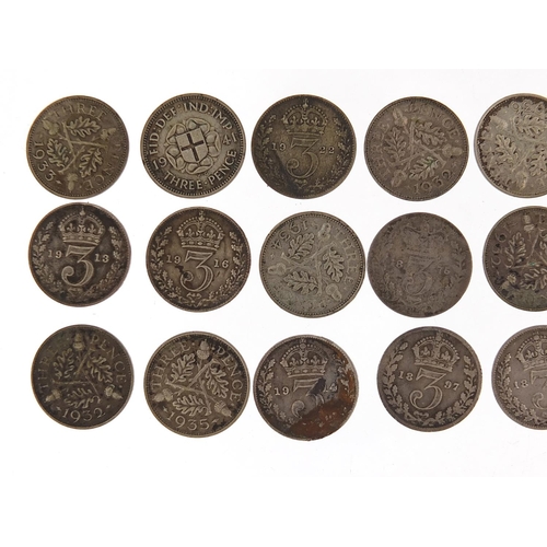 2534 - British silver threepence pieces including Victorian and George V, 33.2g