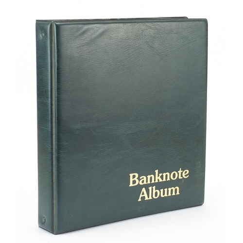 2566 - Album of old banknotes including five pound notes, one pound notes and ten shilling notes, various C... 