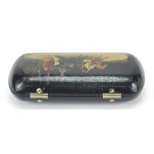 296 - Russian black lacquered papier mache cigarette case hand painted with a Troika, 14cm wide