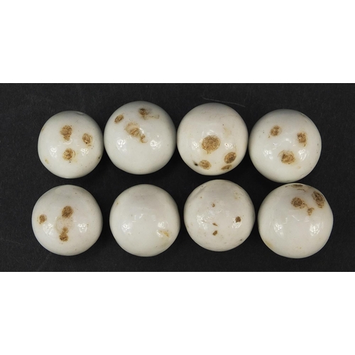 299 - Eight Victorian porcelain numbered balls, each approximately 17mm in diameter