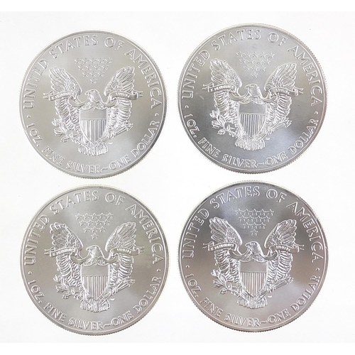 2537 - Four United States of America 2014 fine silver dollars, 125g