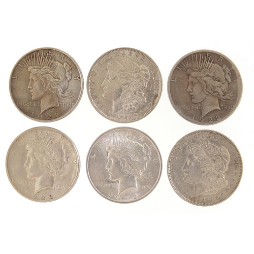 2506 - Six United States of America silver dollars comprising four 1922 Liberty Head dollars and two 1921 M... 