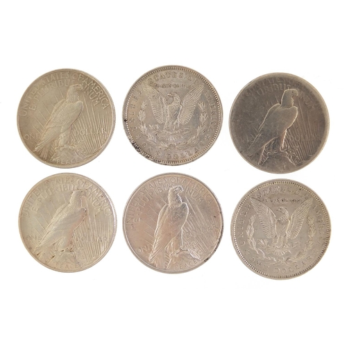 2506 - Six United States of America silver dollars comprising four 1922 Liberty Head dollars and two 1921 M... 