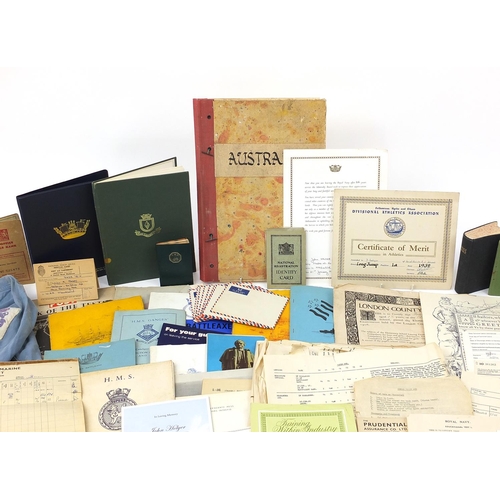 2462 - Collection of naval ephemera and a naval blue shirt with badges all relating to the Hollyer family, ... 