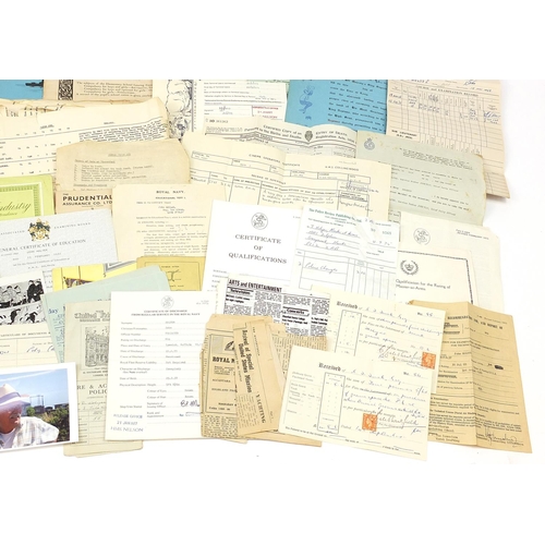 2462 - Collection of naval ephemera and a naval blue shirt with badges all relating to the Hollyer family, ... 