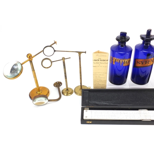 370 - Pharmaceutical items including two Victorian cobalt blue bottles with partial labels, the largest 33... 