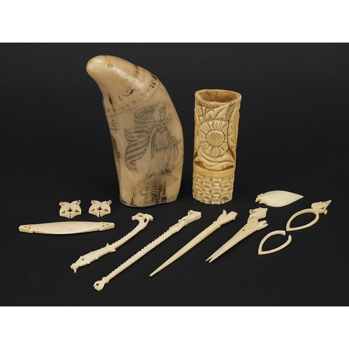 1396 - Ivory, bone and resin objects including scrimshaw, the largest 13cm in length