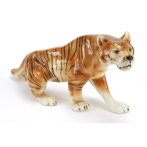 406 - Large Royal Dux porcelain tiger, marks to the underside, 55cm in length