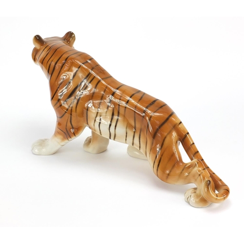 406 - Large Royal Dux porcelain tiger, marks to the underside, 55cm in length