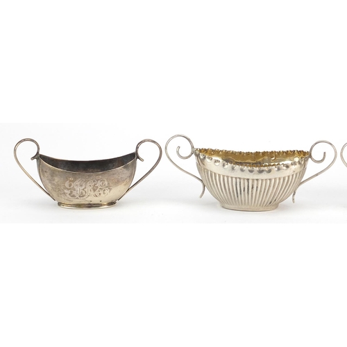 2426 - Two pairs of Victorian silver open salts with twin handles, I L Chester 1899 and H & T Birmingham 18... 