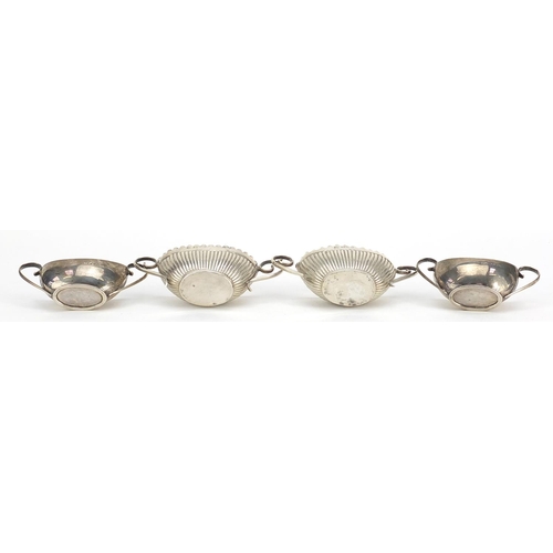 2426 - Two pairs of Victorian silver open salts with twin handles, I L Chester 1899 and H & T Birmingham 18... 