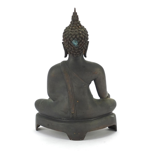 116 - Burmese patinated bronze figure of seated Buddha, 21.5cm high